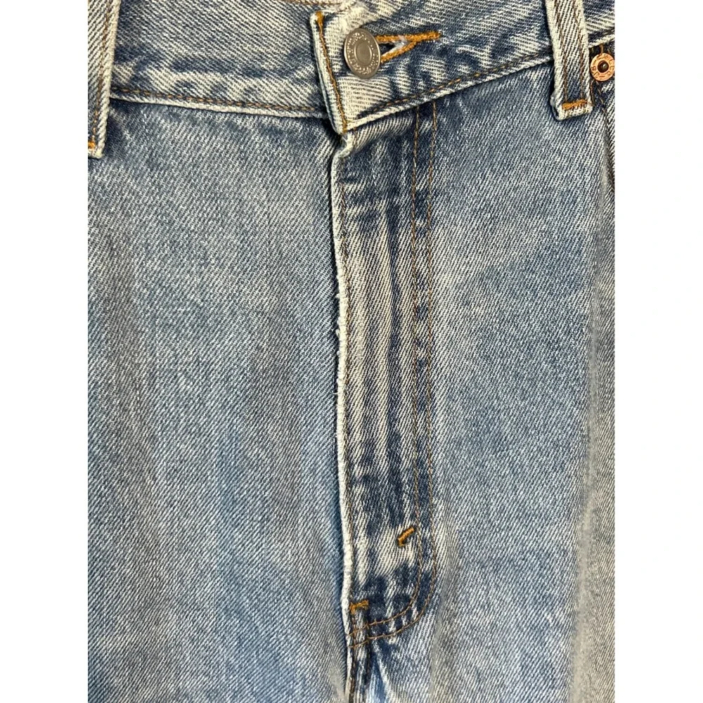 Vintage Levis 550 Mens Relaxed Fit Cut Off Frayed Hem Light Wash Jeans 36x28